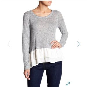 Gray sweater with ruffled bottom